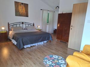 Postel nebo postele na pokoji v ubytování Villa Malini + 43 fotografií