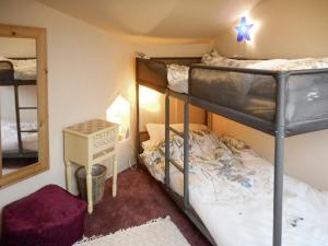 Postel nebo postele na pokoji v ubytování Birkenhead Cottage + 9 fotografií