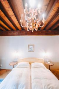 Katil atau katil-katil dalam bilik di Hotel Schloss Dürnstein