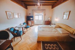 Katil atau katil-katil dalam bilik di Hotel Schloss Dürnstein