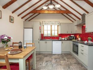 Kuchyň nebo kuchyňský kout v ubytování The Shippen