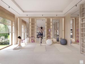 OsiekHotel Molo Resort的房间里有一个骑自行车的女人