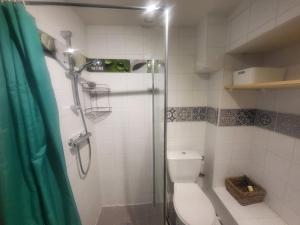 a bathroom with a shower and a toilet with a glass door at Studio cosy 4 pers. front de neige avec WiFi à Montgenèvre - FR-1-266-85 in Montgenèvre