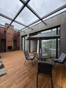 Patio nebo venkovní prostory v ubytování Villa Ambassadori Kachreti Golf Resort