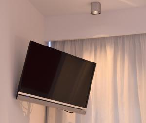 TV a/nebo společenská místnost v ubytování Hotel Julimar