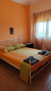 Кровать или кровати в номере Angela's House