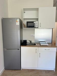 Dapur atau dapur kecil di Apartahotel La Rotonda Cabo Roig