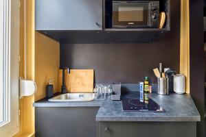 Kuchyň nebo kuchyňský kout v ubytování La Luxury - HyperCentre - Baignoire confort - Ambiance 5 étoiles