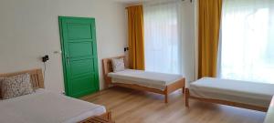 Postel nebo postele na pokoji v ubytování Tady dobrý