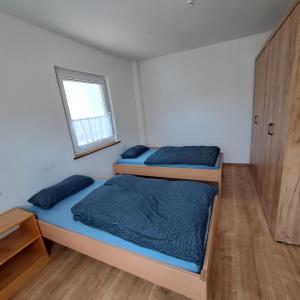 Ένα ή περισσότερα κρεβάτια σε δωμάτιο στο BB-Apart Apartment 1