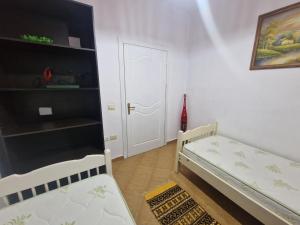 Кровать или кровати в номере Elbasan view point