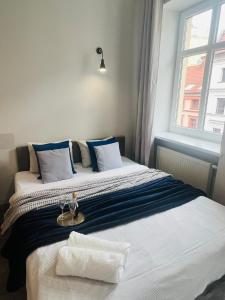 Posteľ alebo postele v izbe v ubytovaní Property Apart - Ruska Centrum