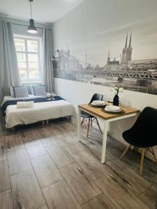 Posteľ alebo postele v izbe v ubytovaní Property Apart - Ruska Centrum