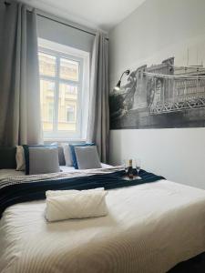 Posteľ alebo postele v izbe v ubytovaní Property Apart - Ruska Centrum