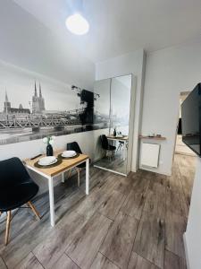 Televízia a/alebo spoločenská miestnosť v ubytovaní Property Apart - Ruska Centrum