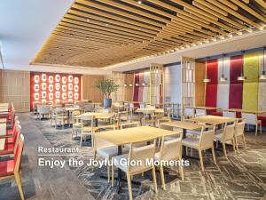a restaurant with tables and chairs in a room at Mitsui Garden Hotel Kyoto Shijo in Kyoto