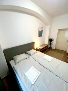 Postel nebo postele na pokoji v ubytování Holeckova125