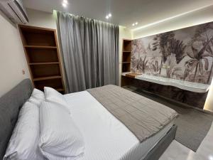 Ένα ή περισσότερα κρεβάτια σε δωμάτιο στο 2BDR -The Square Compound New Cairo - By Kemetland