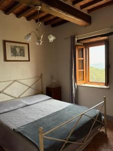 Postel nebo postele na pokoji v ubytování Borgo Chiantina
