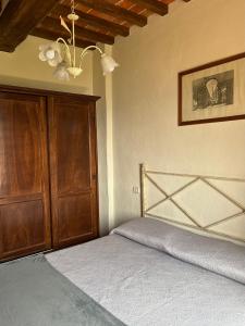 Postel nebo postele na pokoji v ubytování Borgo Chiantina