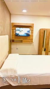 Ένα ή περισσότερα κρεβάτια σε δωμάτιο στο Suite Deluxe Valledupar +10 φωτογραφίες