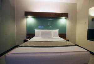 Krevet ili kreveti u jedinici u okviru objekta Microtel by Wyndham UP Technohub