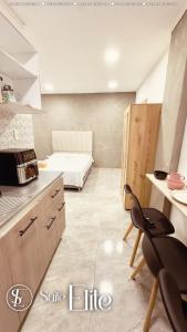 Η κουζίνα ή μικρή κουζίνα στο Suite Deluxe Valledupar