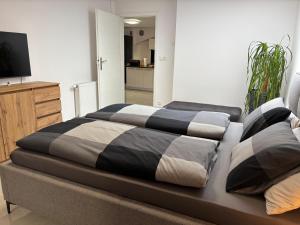 Postel nebo postele na pokoji v ubytování Apartament Siemionkowo