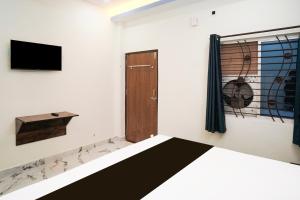 Postel nebo postele na pokoji v ubytování Hotel O The Value