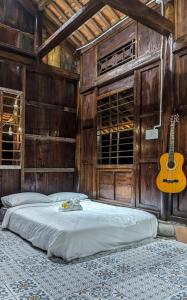 Postel nebo postele na pokoji v ubytování Thỏ House