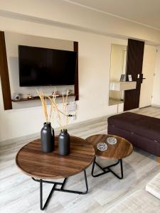 a living room with a coffee table and a couch at Departamento de estreno - Pueblo libre in Lima