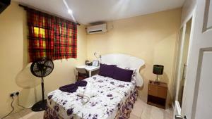Llit o llits en una habitació de Argalo Suites 1