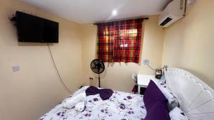 Llit o llits en una habitació de Argalo Suites 1