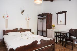 Ένα ή περισσότερα κρεβάτια σε δωμάτιο στο Casa Pescareasca - Complex Plaja Golf