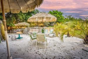 Aed väljaspool majutusasutust Tiki Bliss Pool & Resort Vibe