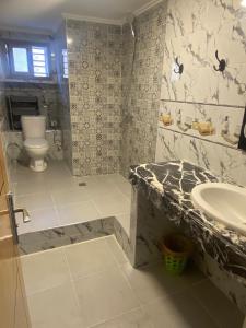 Bilik mandi di logement meknes +8 gambar