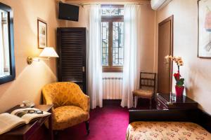 Posezení v ubytování Hotel Agli Alboretti
