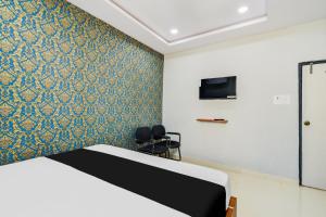 TV a/nebo společenská místnost v ubytování Hotel O SSR Grand + 21 fotografií