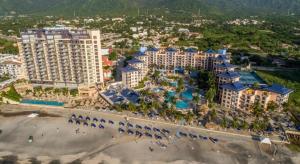 an aerial view of a resort with a beach at Zuana Beach Resort in Santa Marta