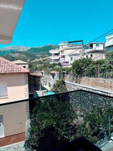 a view from the balcony of a house at Vironas Hotel in Himare