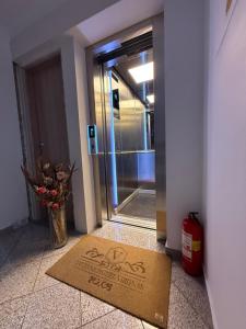 a welcome mat in front of a door at Vironas Hotel in Himare
