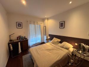 Postel nebo postele na pokoji v ubytování Cornich' Kennedy