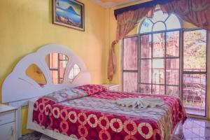 Postel nebo postele na pokoji v ubytování Hotel Amigo + 54 fotografií