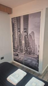Departamento NYC 2 - Edificio VILAUT by INMOVE Temporarios客房内的一张或多张床位