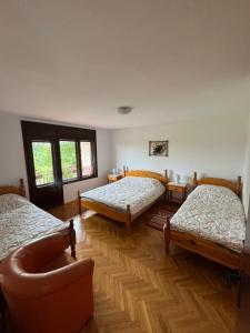 Postel nebo postele na pokoji v ubytování Vila Trtović