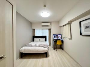 Letto o letti in una camera di Otsuka No3 Mansion #JR Yamanote Line#Fixed Wifi