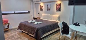 Postel nebo postele na pokoji v ubytování Departamento 5 Londres - Edificio VILAUT by INMOVE Temporarios + 7 fotografií