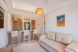 Χώρος καθιστικού στο RODADERO EXCLUSIVO - 2hab Suite a METROS DEL MAR