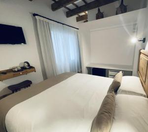 Posteľ alebo postele v izbe v ubytovaní Hotel Casa Miranda - Adults Only