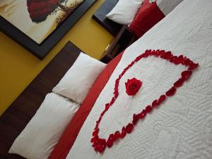 Postel nebo postele na pokoji v ubytování Hotel Tepoztlán